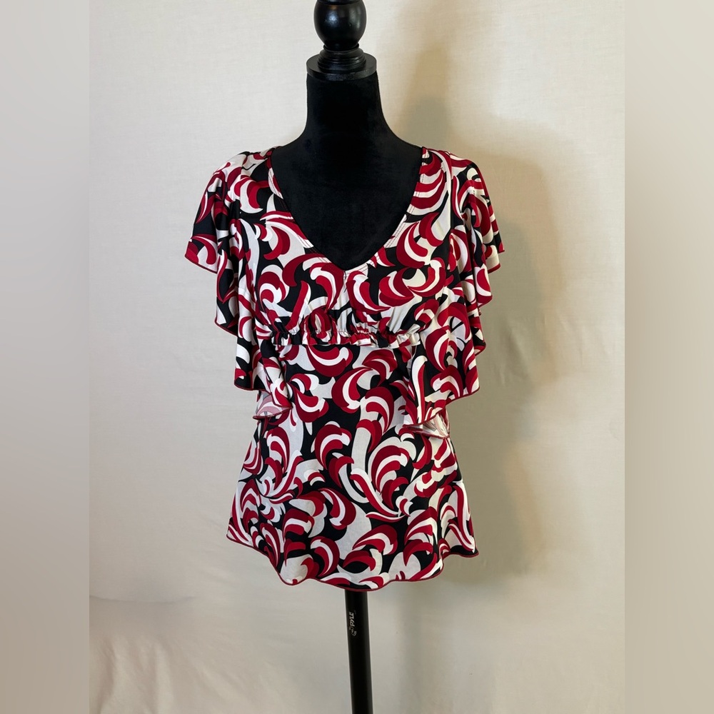 Chic Red and Black Blouse with Striking Swirl Design